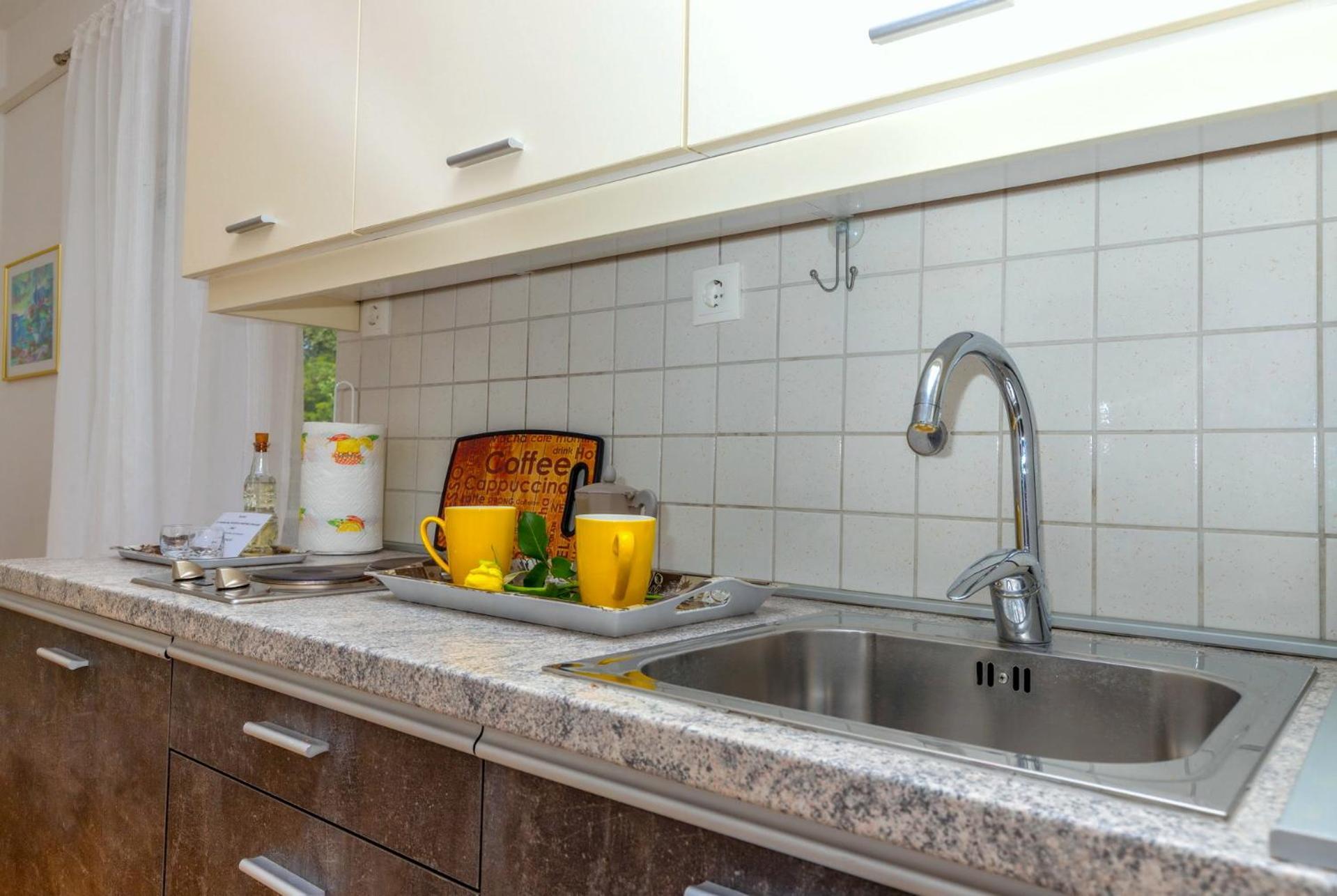 Apartments Kremenici Malinska Bagian luar foto